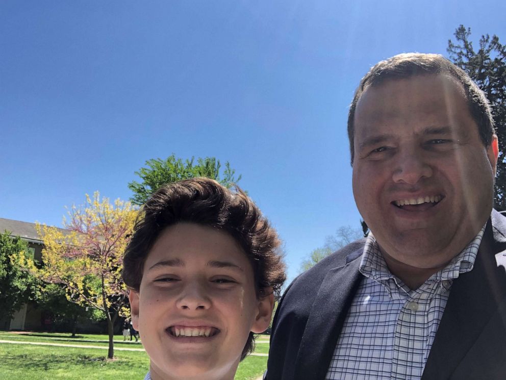 John Botti, cofounder of Farms to Food Banks, is seen here with his son.