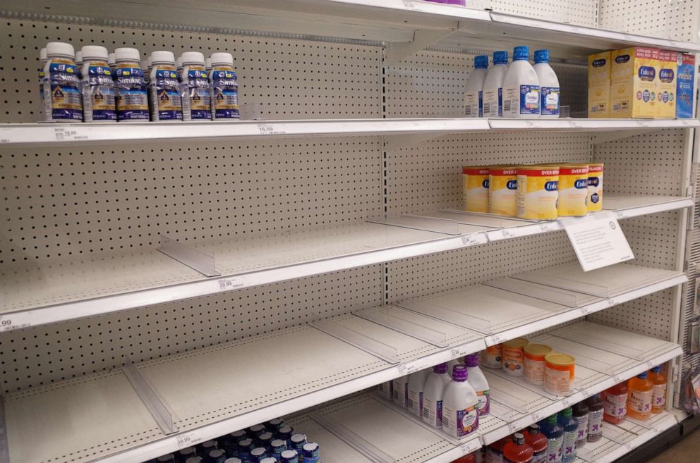 PHOTO: Similac and Enfamil products are seen on largely empty shelves in the baby formula section of a Target store, amid continuing nationwide shortages in infant and toddler formula, in San Diego, May 25, 2022. 
