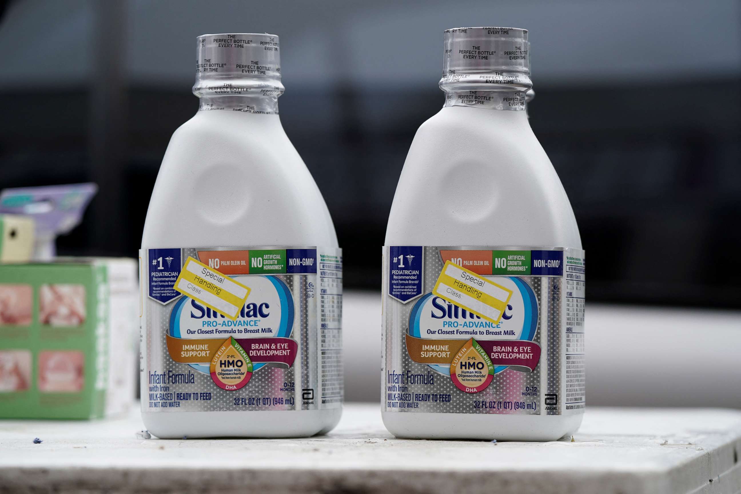 PHOTO: Bottles of Similac Pro-Advance infant formula are displayed at a give-away of food and baby formula amid continuing nationwide shortages in infant and toddler formula, in San Diego, Calif., May 25, 2022.