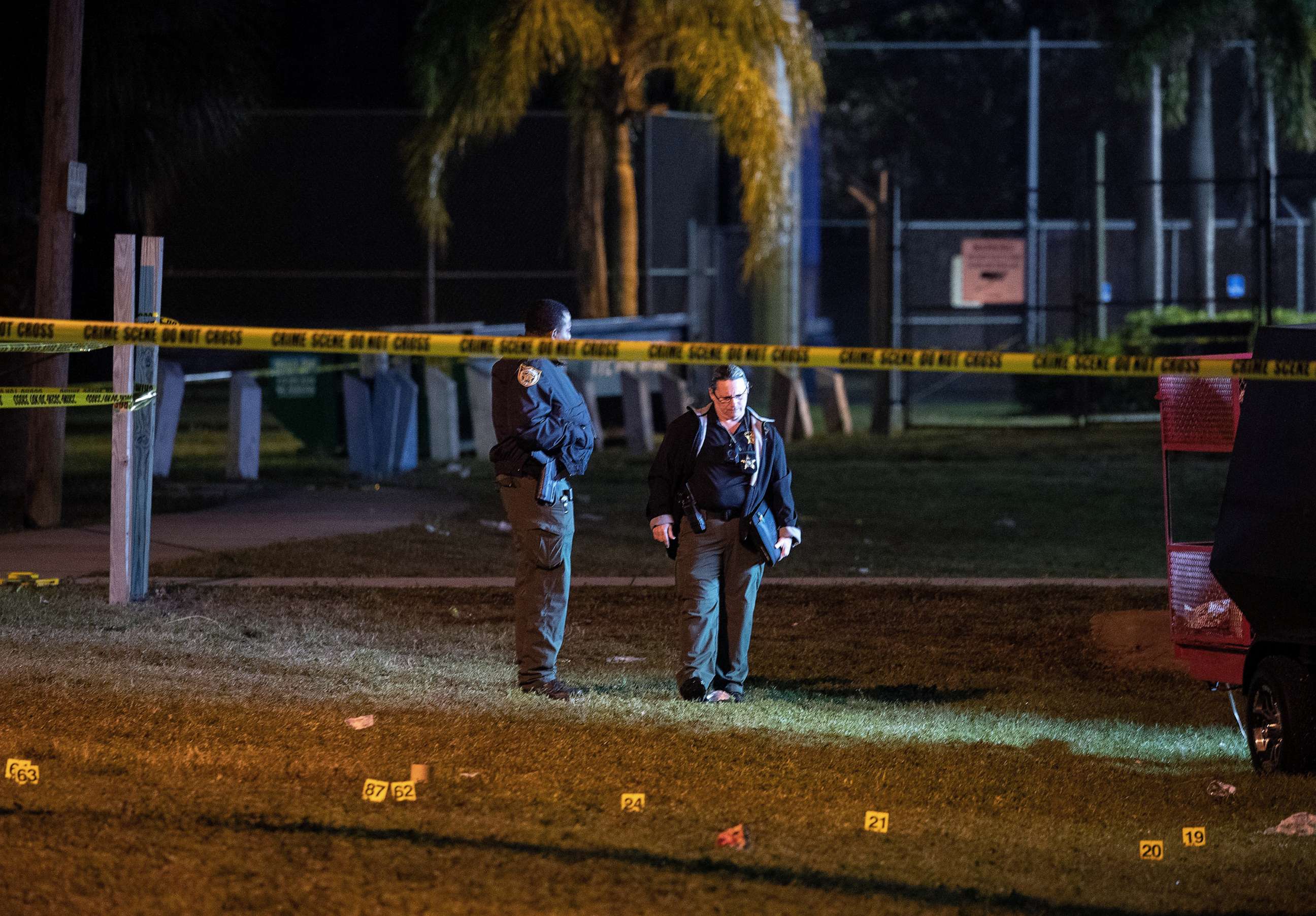 PHOTO: St. Lucie County Sheriff deputies work at a crime scene following a shooting during a Martin Luther King Jr. Day event in Fort Pierce, Fla., Jan. 17, 2023.