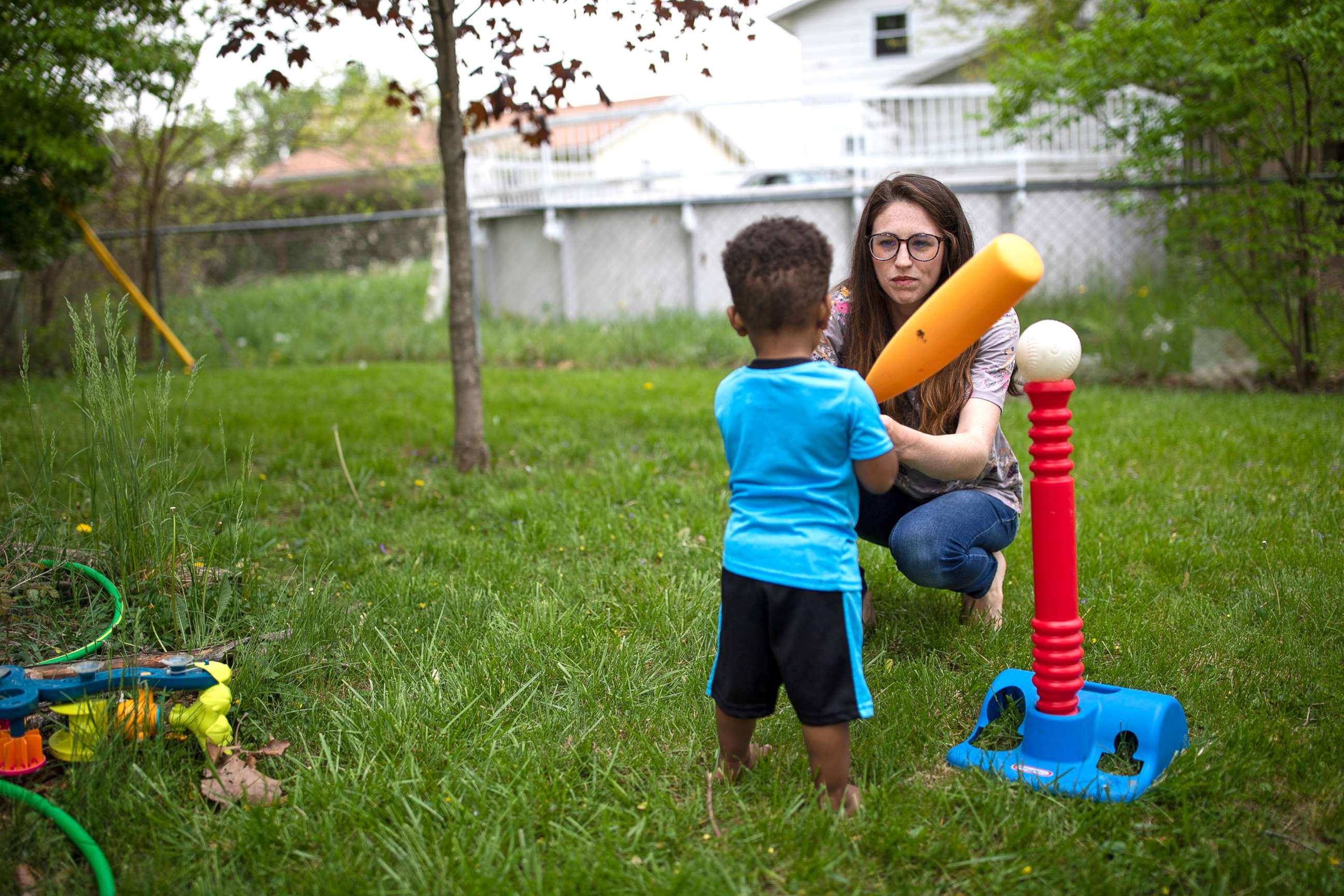PHOTO: A foster parent plays with her foster son outside of her home in Columbus, Ohio, on April 28, 2021. 