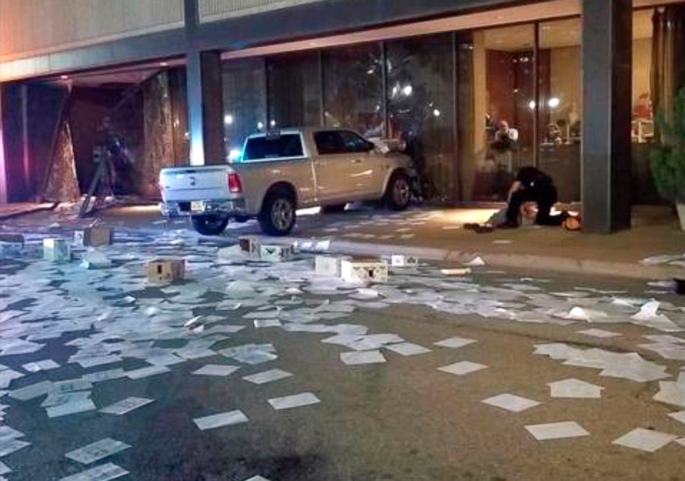 PHOTO: A man is detained after crashing his pickup truck into the side of the Fox affiliate television station building in downtown Dallas, Sept. 5, 2018.