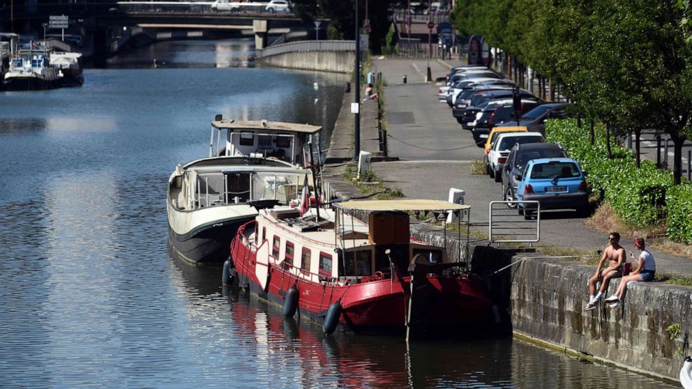 PHOTO: Boats and barges are docked in the Port Saint-Sauveur area near the centre of Toulouse, southern France, on May 28, 2020.