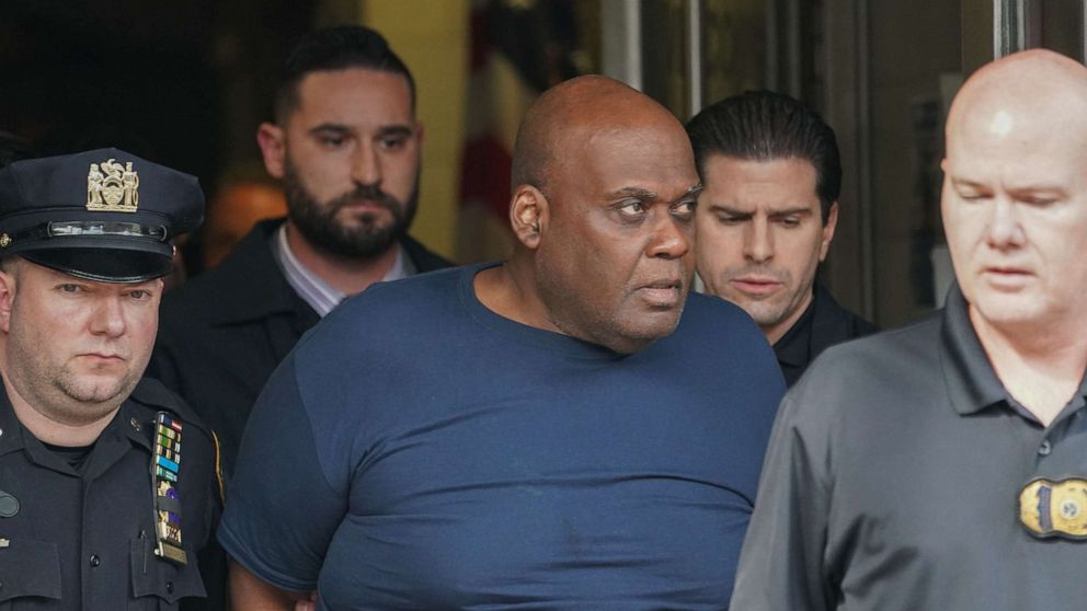 PHOTO: In this file photo taken on April 13, 2022, Frank James, 62, is led away from the 9th Precinct into Federal Custody in New York City after he was arrested on the Lower East Side in Manhattan by two patrol officers.