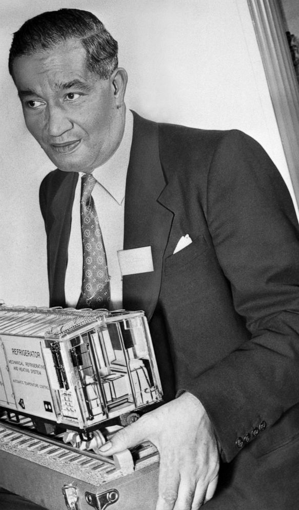 PHOTO: Frederick McKinley Jones poses with model of a refrigerated railroad car.