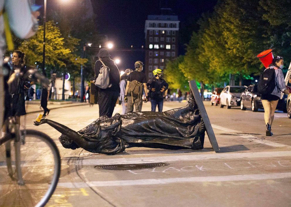 PHOTO: Wisconsin's "Forward" statue lies in the street on Capitol Square in Madison, Wis., June 23, 2020.