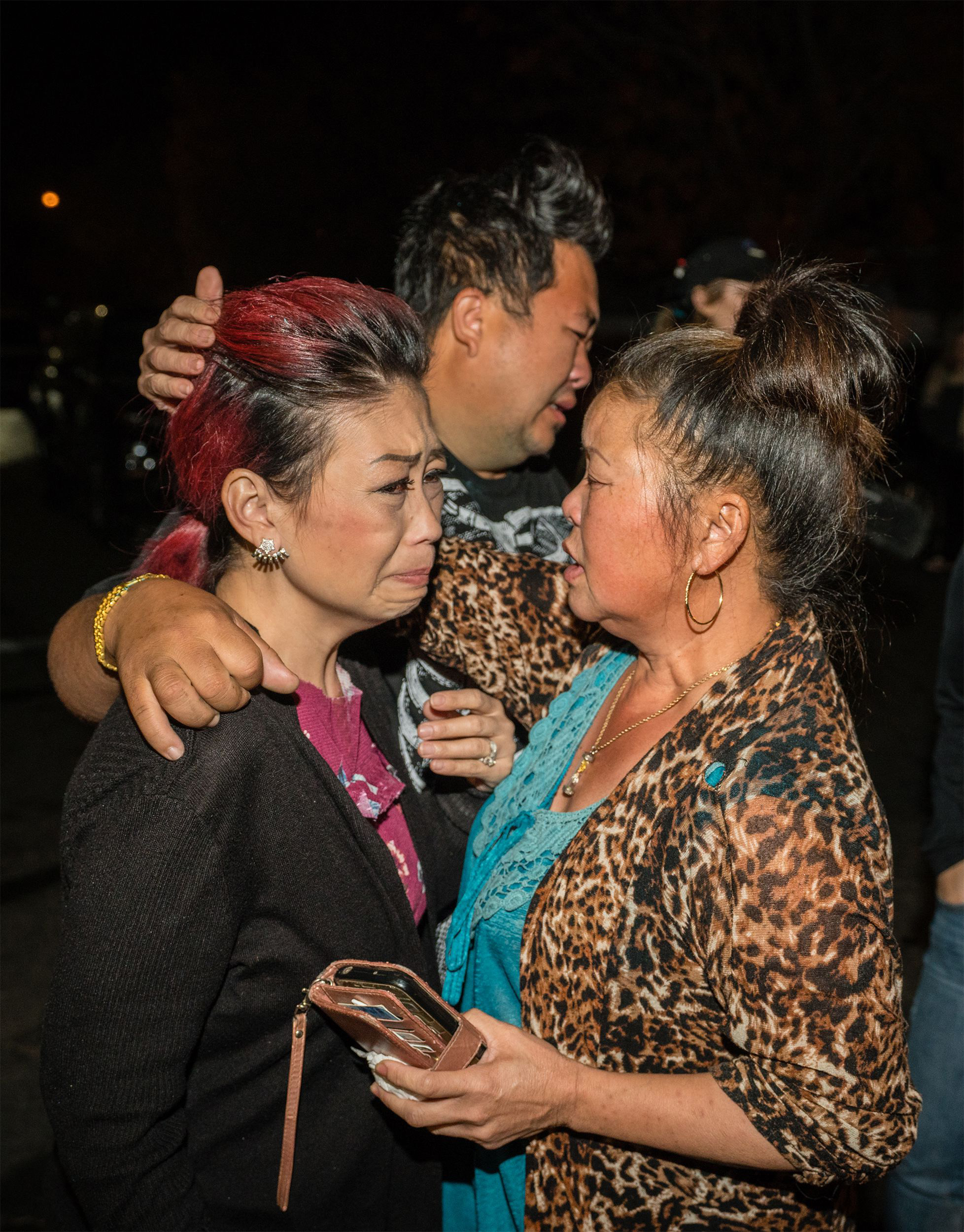 PHOTO: People react near the scene of a shooting in Fresno, Calif., Nov. 17 2019.