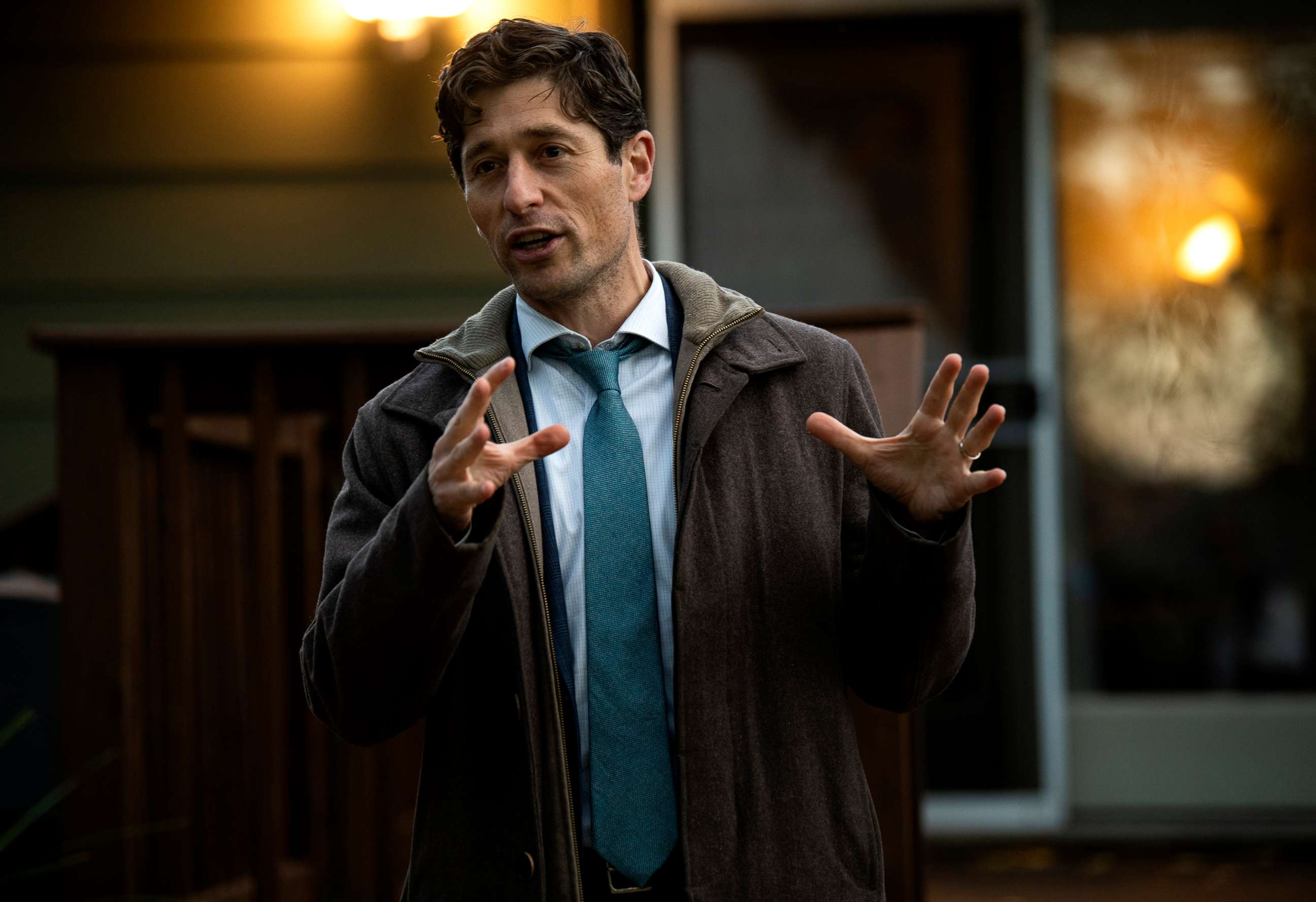 PHOTO: Minneapolis mayor Jacob Frey speaks with constituents at a backyard campaign event, Oct. 26, 2021, in Minneapolis.