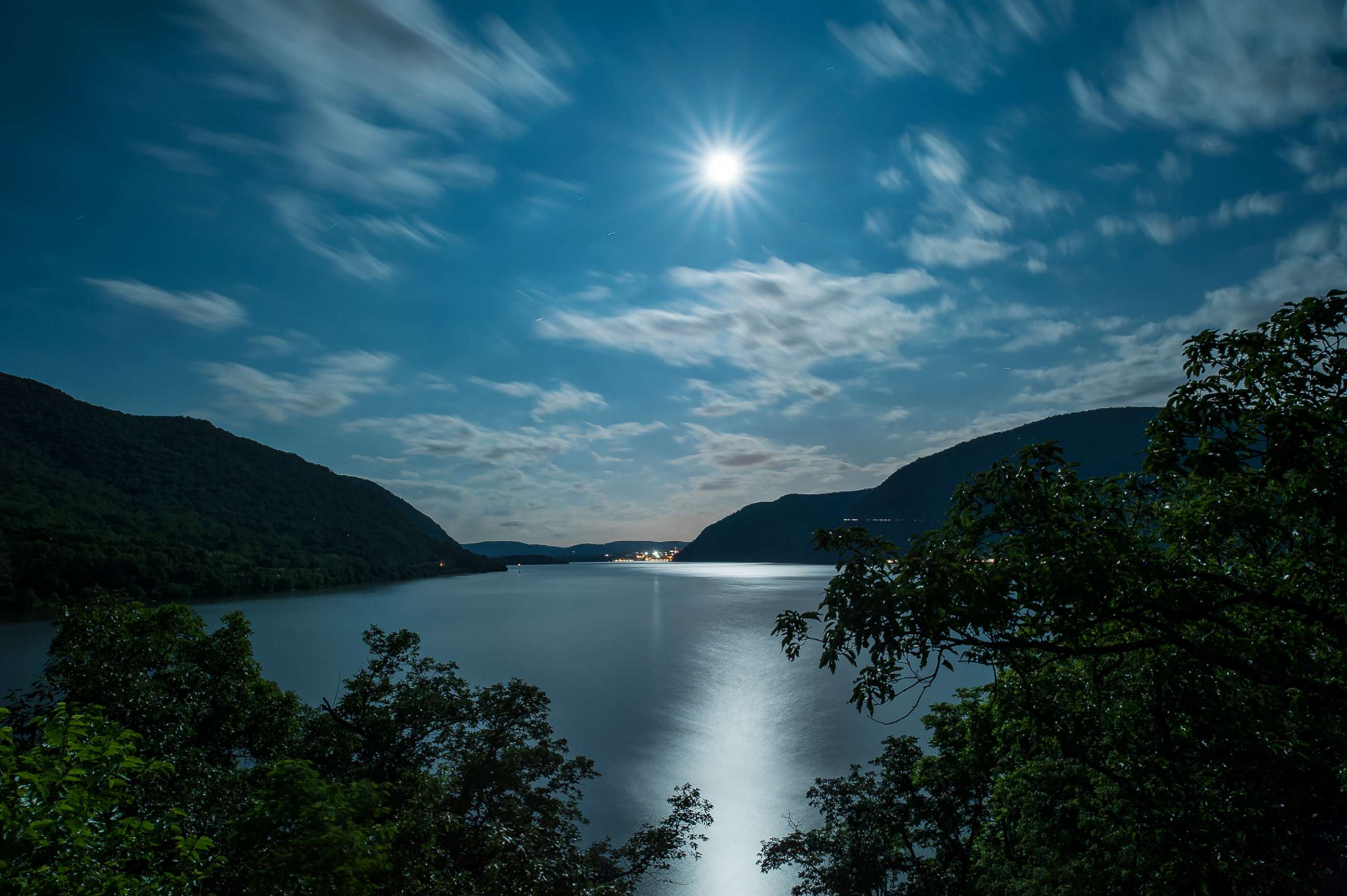 PHOTO: A full moon is photographed over the Hudson River on June 2, 2012 from Bannerman Castle in Duchess County, New York.