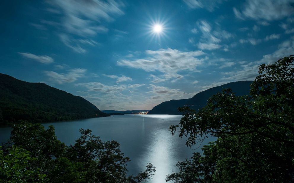 PHOTO: A full moon is photographed over the Hudson River on June 2, 2012 from Bannerman Castle in Duchess County, New York.
