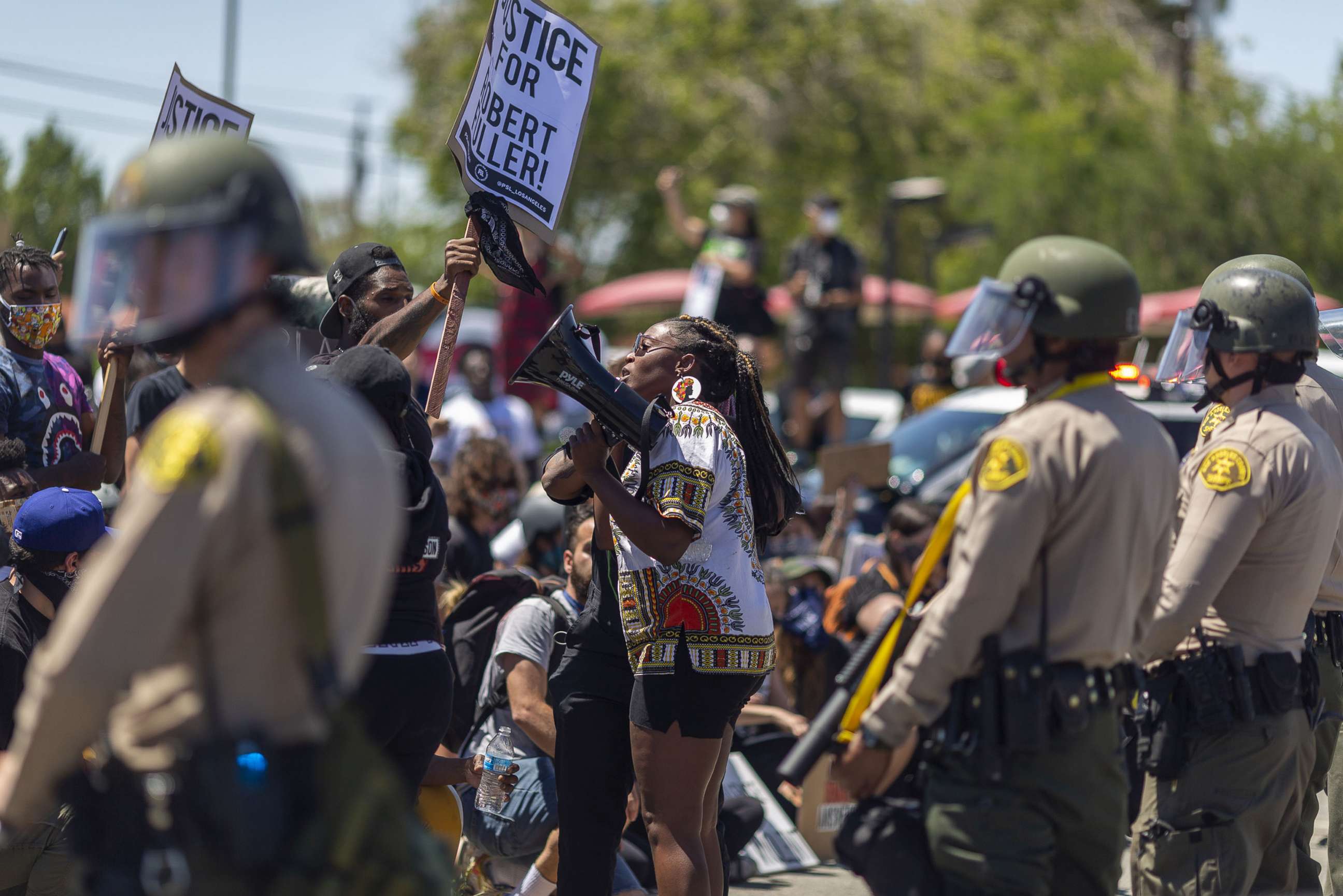 PHOTO: Officers block marchers from continuing down E. Palmdale Boulevard (State Route 138) after a demonstration, June 13, 2020, in Palmdale, Calif.