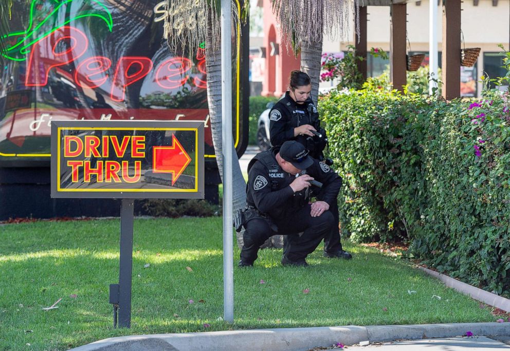 PHOTO: Police investigate the scene where a retired Cal State Fullerton administrator was stabbed to death, Aug. 19, 2019 in Fullerton, Calif.