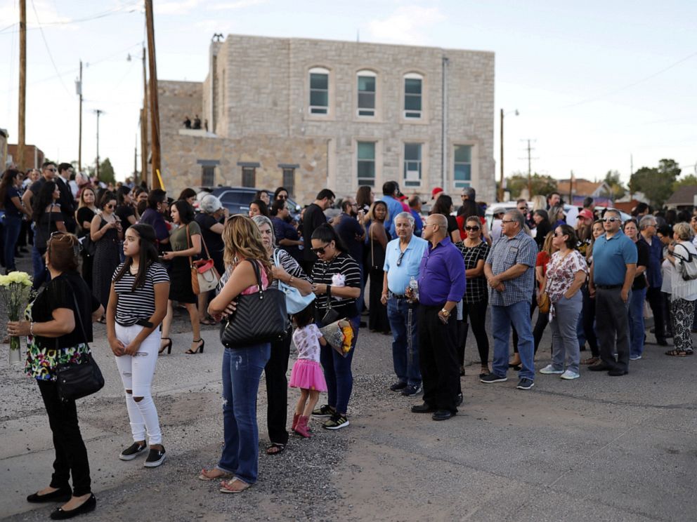 PHOTO: Mourners form a line outside the La Paz Faith memorial center during the public visitation service of Walmart shooting victim Margie Reckard, to which her husband Antonio Basco had invited the community in El Paso, Texas, U.S. August 16, 2019.