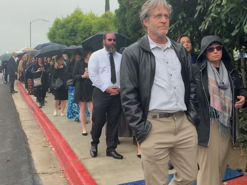 PHOTO: Mourners wait to attend a funeral service for Lori Gilbert-Kaye, the woman killed in a shooting at Chabad of Poway near San Diego, Calif., April 29, 2019.