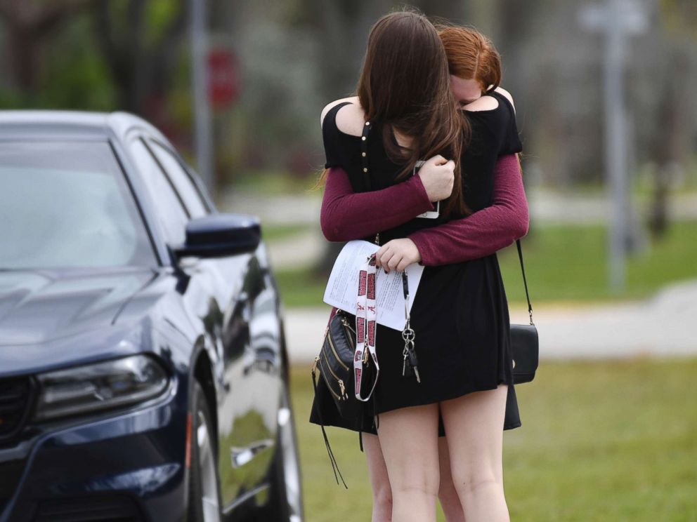 PHOTO: Mourners react as they leave the funeral services for slain Marjory Stoneman Douglas student Carmen Schentrup, Feb. 20, 2018, at St. Andrew Catholic Church in Coral Springs, Fla.