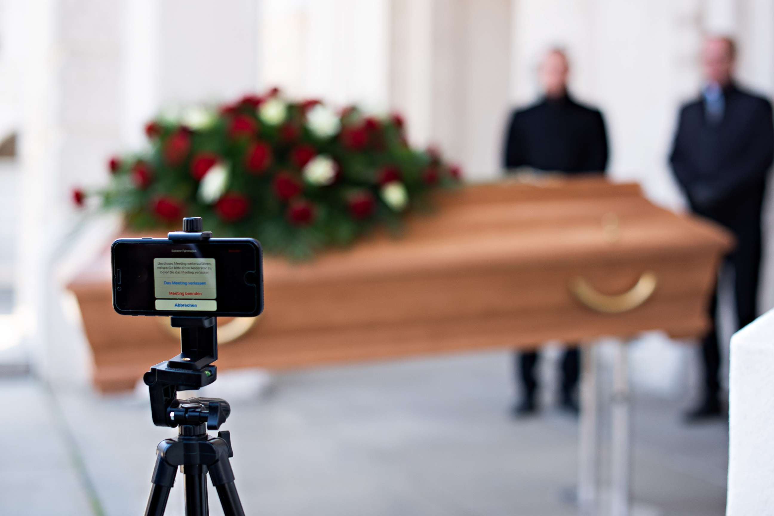 PHOTO: Employees of Bestattung Himmelblau undertakers rehearse livestreaming an upcoming funeral, on March 24, 2020 ,in Vienna, Austria.