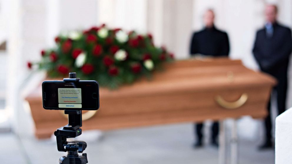 PHOTO: Employees of Bestattung Himmelblau undertakers rehearse livestreaming an upcoming funeral, on March 24, 2020 ,in Vienna, Austria.
