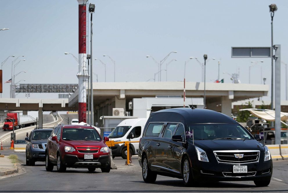 PHOTO: The hearse carrying the body of elementary school teacher Elsa Mendoza, who was killed during the shooting at a Walmart store in El Paso last Saturday, is seen after crossing the U.S. border to take her to a funeral parlor in Ciudad Juarez, Mexico.