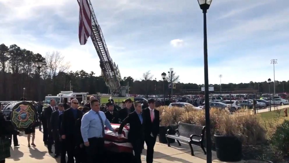 People attend a funeral for Natalie Dempsey, a 21-year-old volunteer firefighter at the Mizpah Volunteer Fire Company in New Jersey, Dec. 30, 2018.
