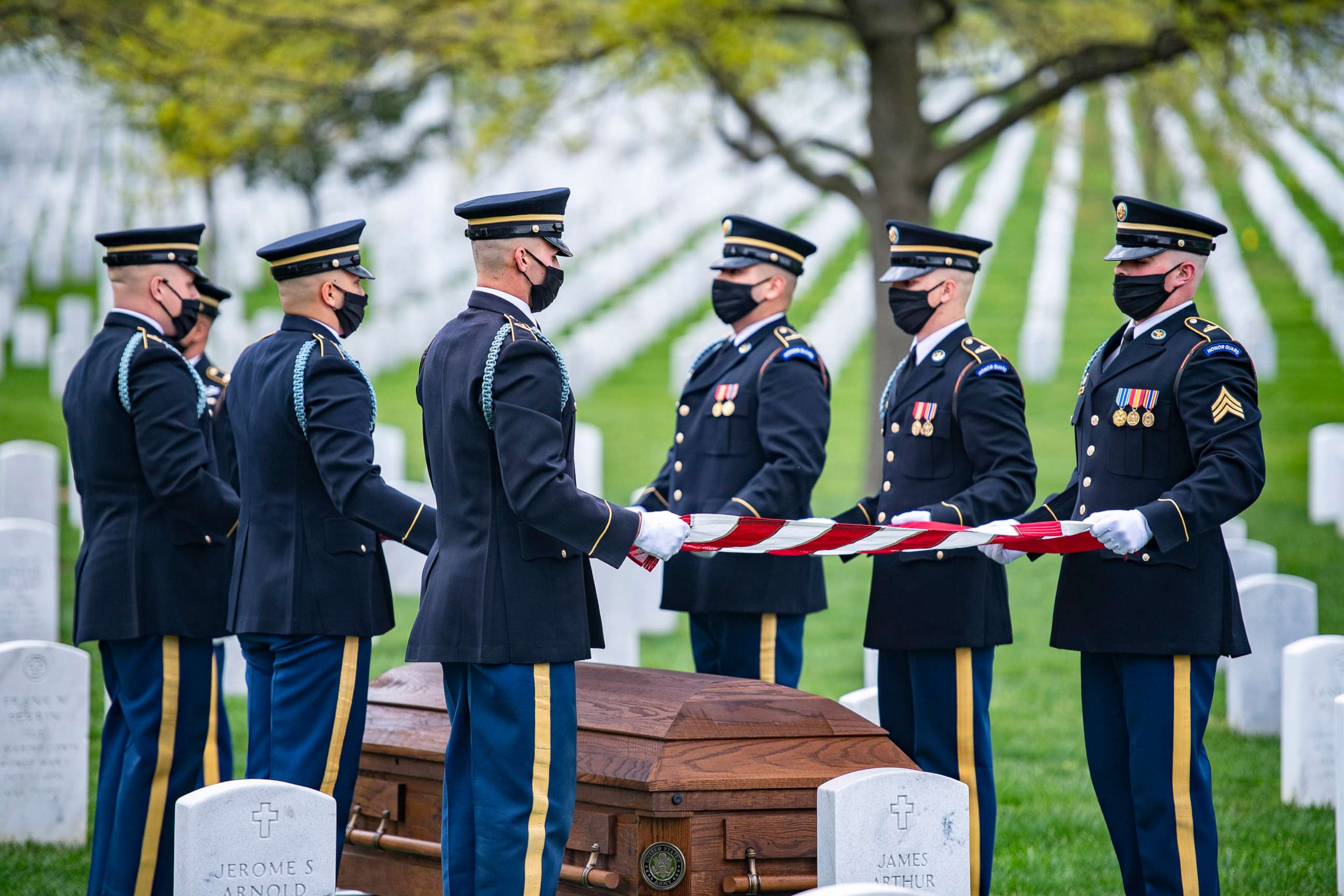 Soldiers assigned to 1st Battalion, 3d U.S. Infantry Regiment (The Old Guard) conduct modified military funeral honors for U.S. Army Retired Command Sgt. Maj. Robert M. Belch in Section 68 of Arlington National Cemetery, Arlington, Va., April 14, 2020.