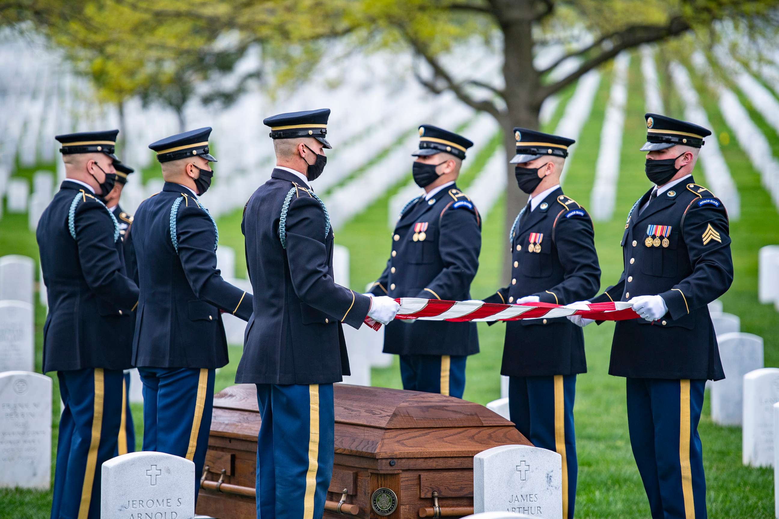 At Arlington National Cemetery, military funeral includes social