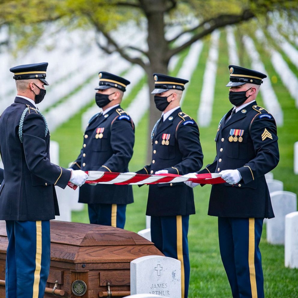 VIDEO: At Arlington National Cemetery, military funerals continue with honor guard in masks 