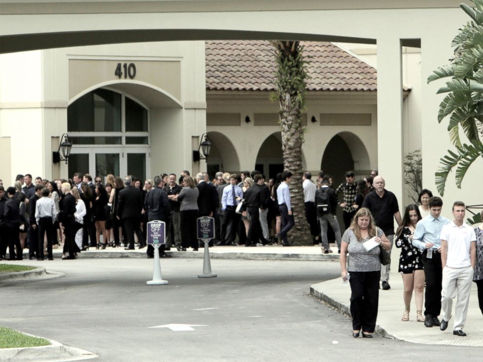 PHOTO: Mourners leave the Church by the Glades in Coral Springs, Fla.,Feb. 19, 2018, after funeral services for Luke Hoyer.