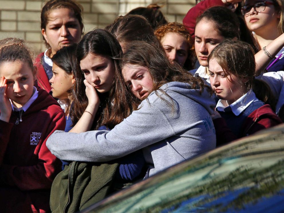 PHOTO: Students from the Yeshiva School in Pittsburgh stand outside Beth Shalom Synagogue after attending the funeral service for Joyce Fienberg, Oct. 31, 2018.