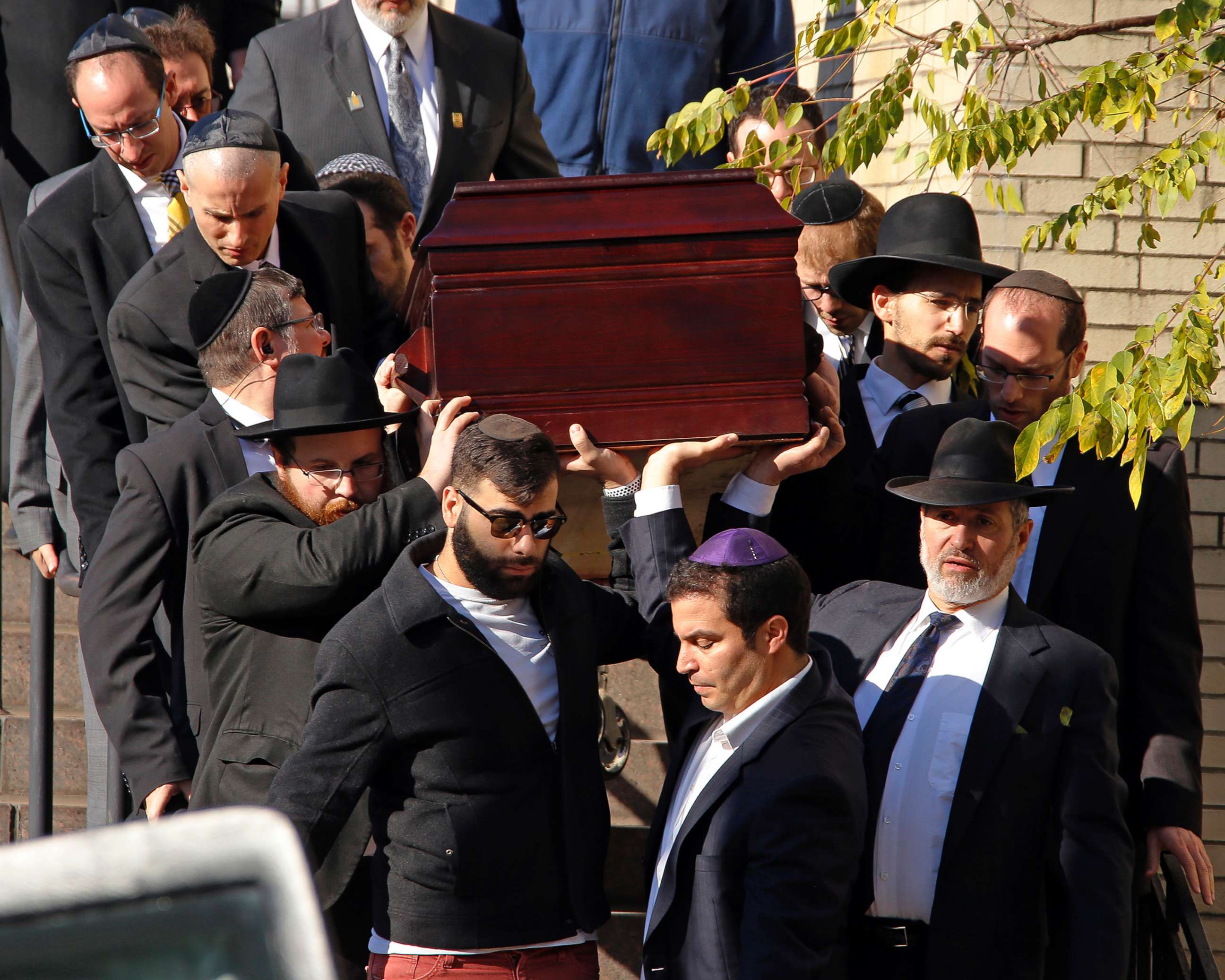 PHOTO: Pallbearers carry the casket of Joyce Fienberg from the Beth Shalom Synagogue following a funeral service in Pittsburgh, Oct. 31, 2018.