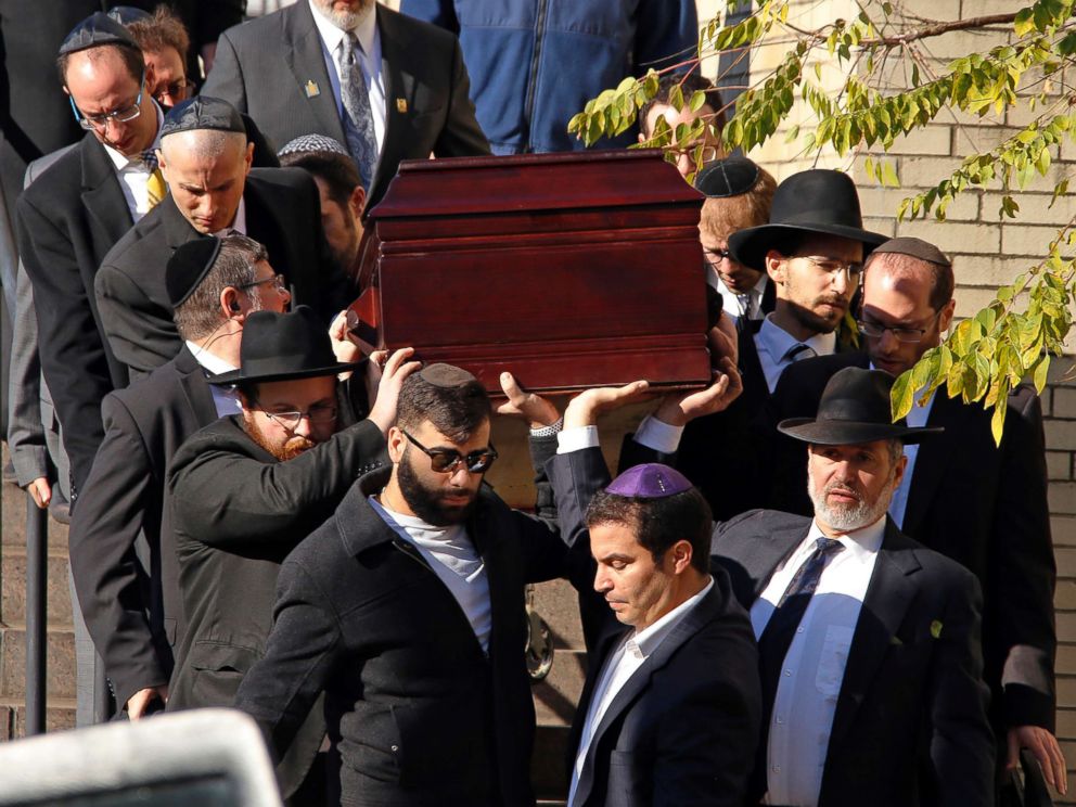 PHOTO: Pallbearers carry the casket of Joyce Fienberg from the Beth Shalom Synagogue following a funeral service in Pittsburgh, Oct. 31, 2018.