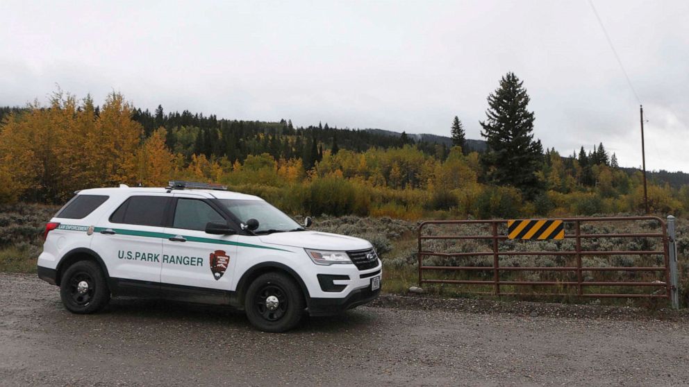 PHOTO: A U.S. Park Ranger vehicle drives in the Spread Creek area in the Bridger-Teton National Forest, just east of Grand Teton National Park off U.S. Highway 89, on Sept. 19, 2021, in Wyoming.