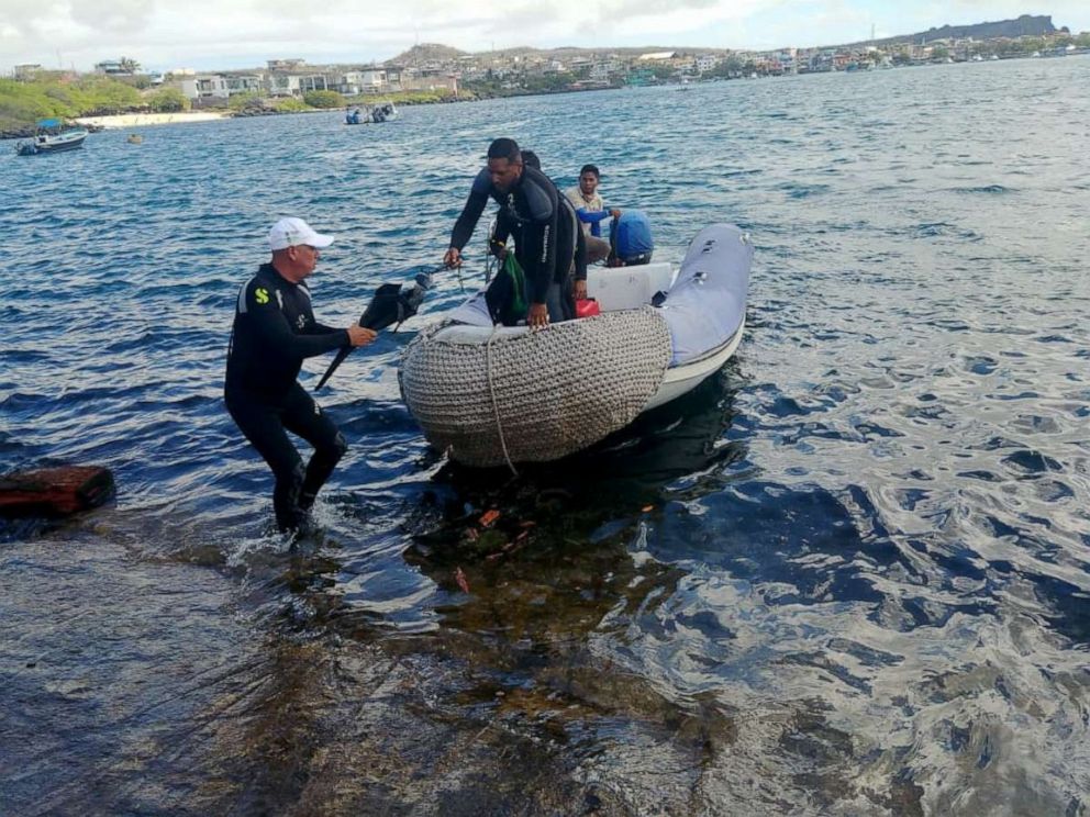 PHOTO: Ecuadorean park and naval crews were on site, Dec. 23, 2019, laying out containment barriers and absorbent cloths in an effort to contain the spill.