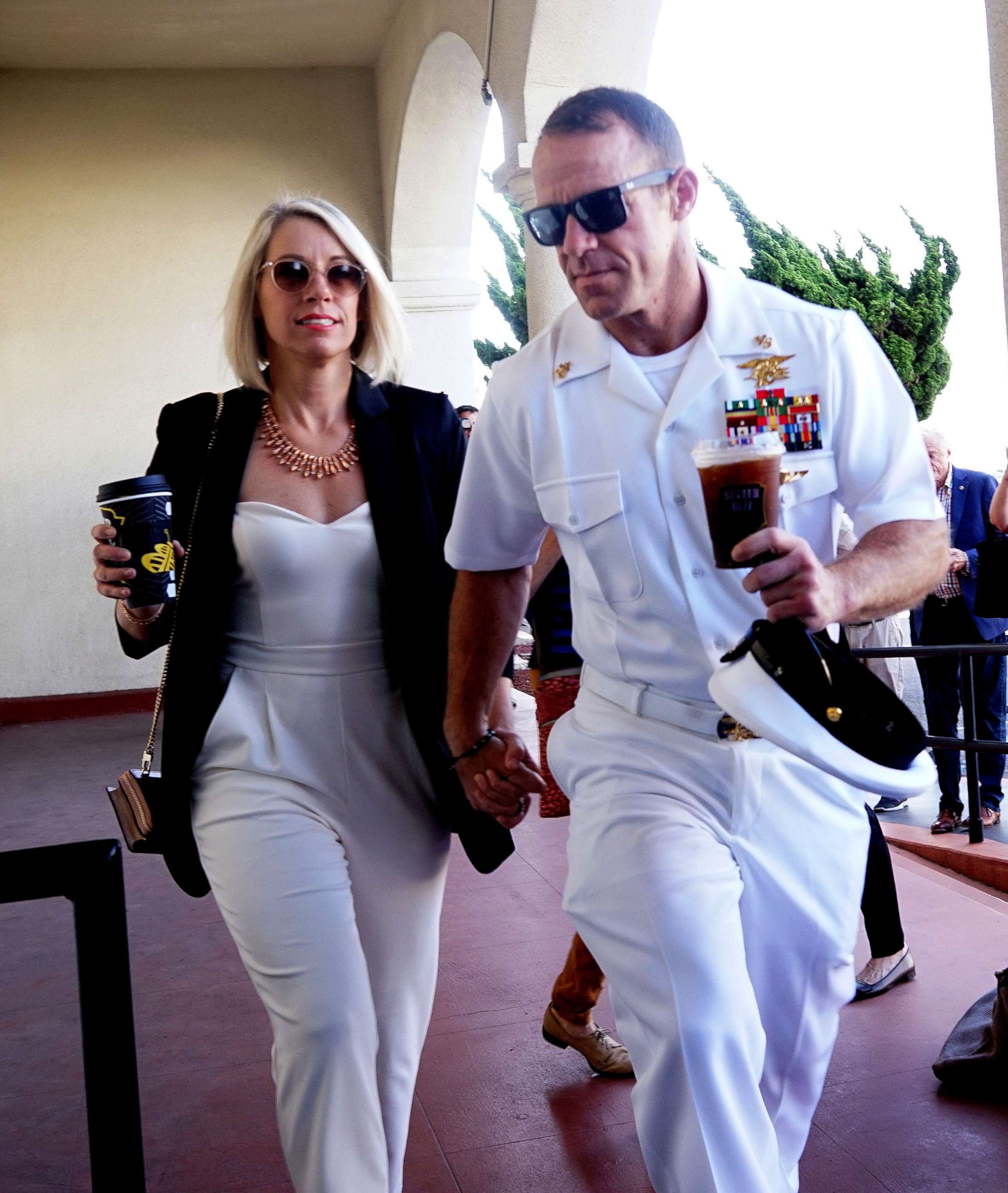 PHOTO: Navy Special Operations Chief Edward Gallagher walks into military court with his wife Andrea Gallagher, July 2, 2019, in San Diego, Calif.