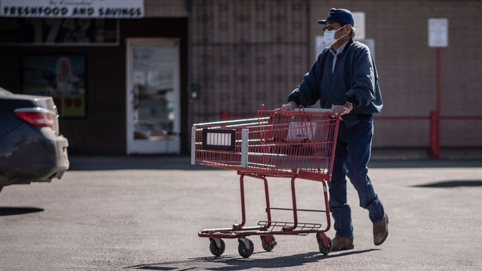 PHOTO: A man pushed a shopping cart in Gallup, N.M., April 3, 2020. 
