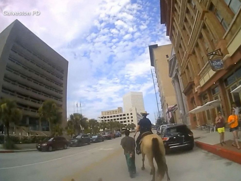PHOTO: Galveston police released bodycam footage of Donald Neely being walked through Galveston by officers on horseback.