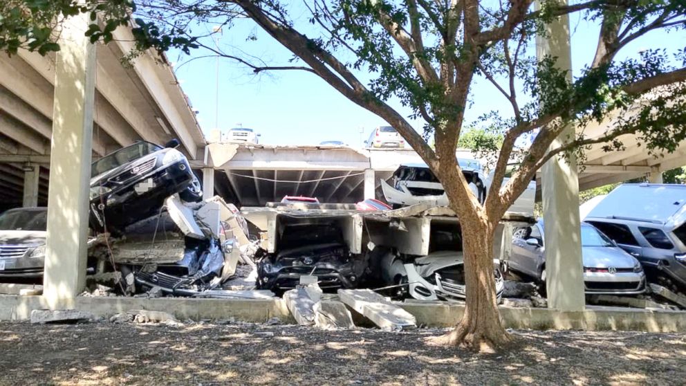 PHOTO: Photos of the aftermath showed several cars piled up on each other, at odd angled, hanging off platforms or with their fenders smashed.