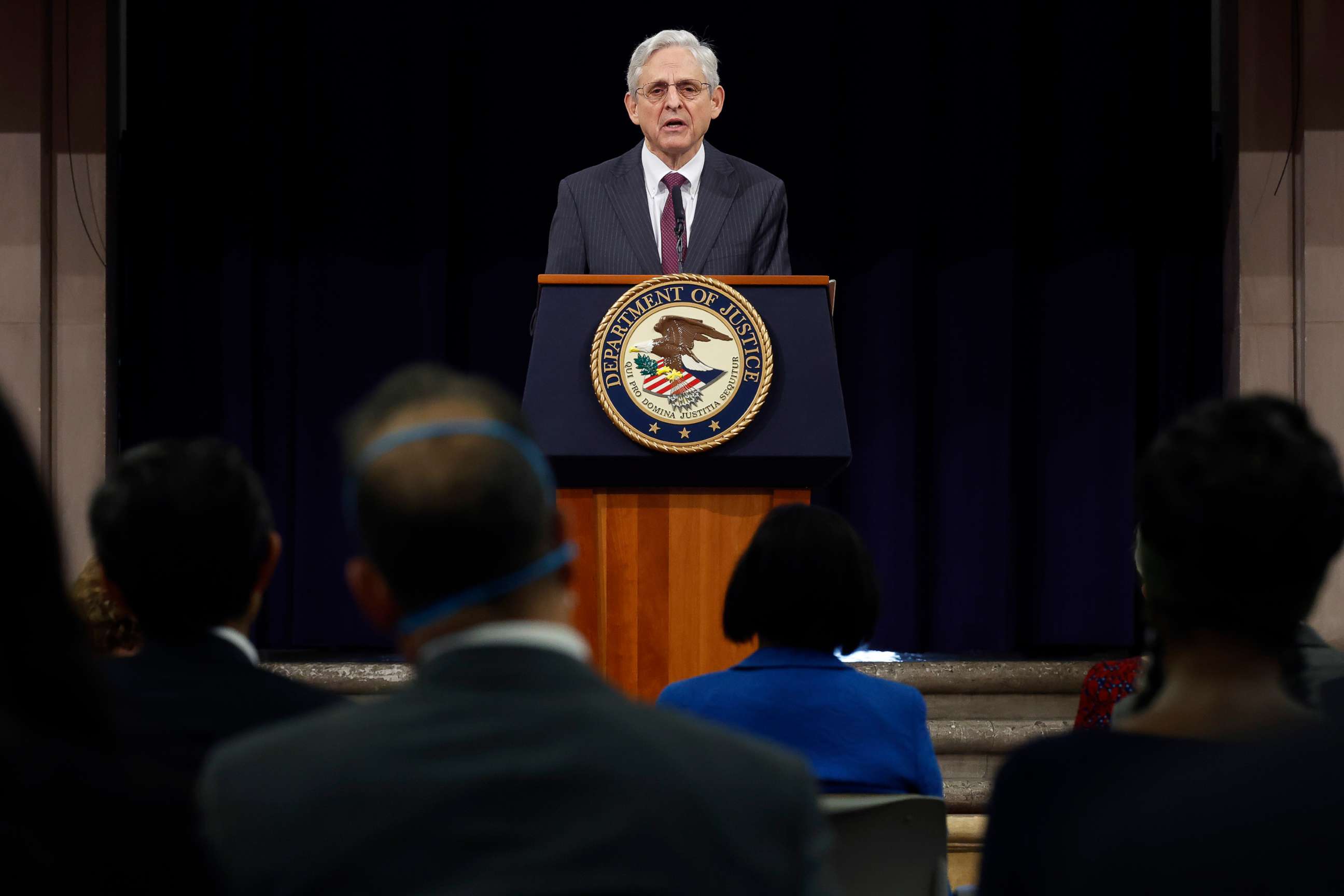 PHOTO: Attorney General Merrick Garland delivers remarks during an event to mark the first anniversary of the COVID-19 Hate Crimes Act at the Department of Justice Robert F. Kennedy Building, May 20, 2022, in Washington, D.C. 