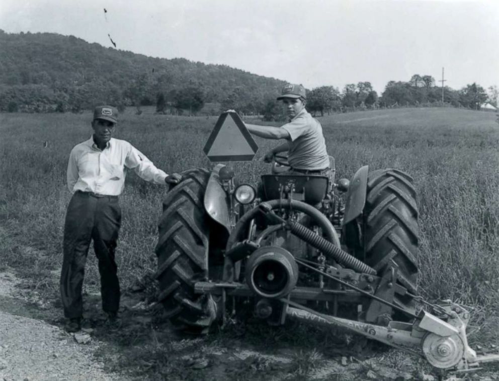 PHOTO: U.S. Army 1st Lt. Garlin M. Conner with his son Paul, on the family farm in the 1970's.