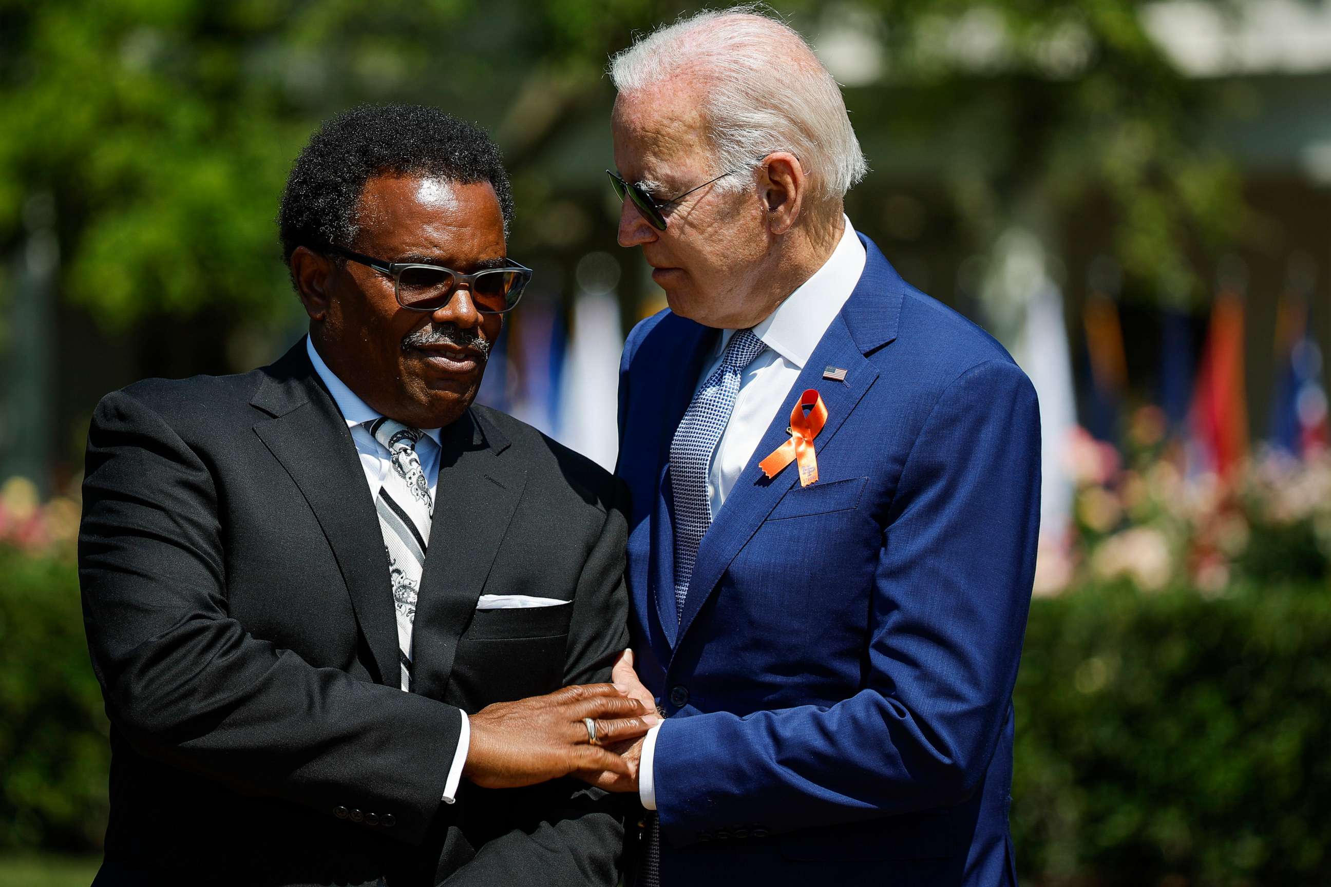 PHOTO: President Joe Biden embraces Garnell Whitfield Jr., the son of Ruth Whitfield who was killed in a mass shooting in Buffalo, NY, at an event on the South Lawn of the White House, July 11, 2022, in Washington.