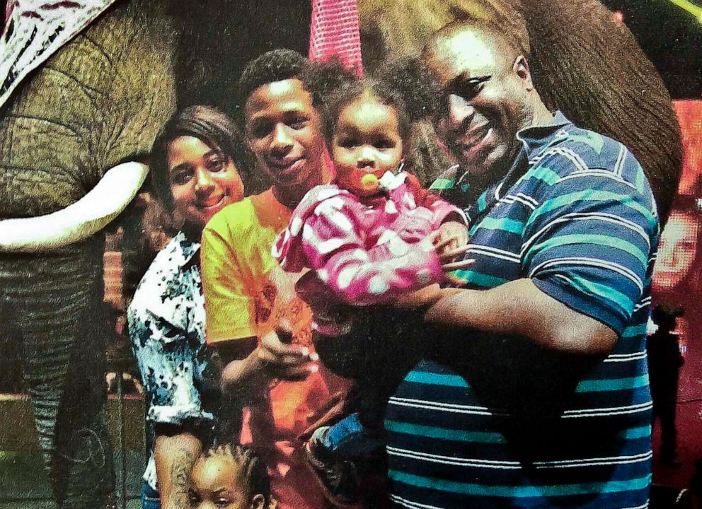 PHOTO: In this undated family file photo provided by the National Action Network, Eric Garner, right, poses with his children during a family outing.