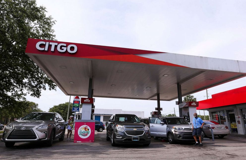 PHOTO: A steady steam of cars flow in and out of the Citgo gas station on May 12, 2021, in St. Petersburg, Fla.