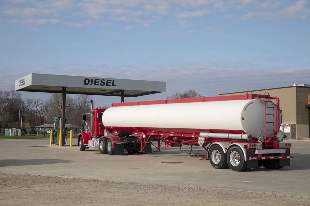 PHOTO: A tanker truck sits parked outside a Phillips 66 gas station as fuel is delivered in Princeton, Ill., April 1, 2020.