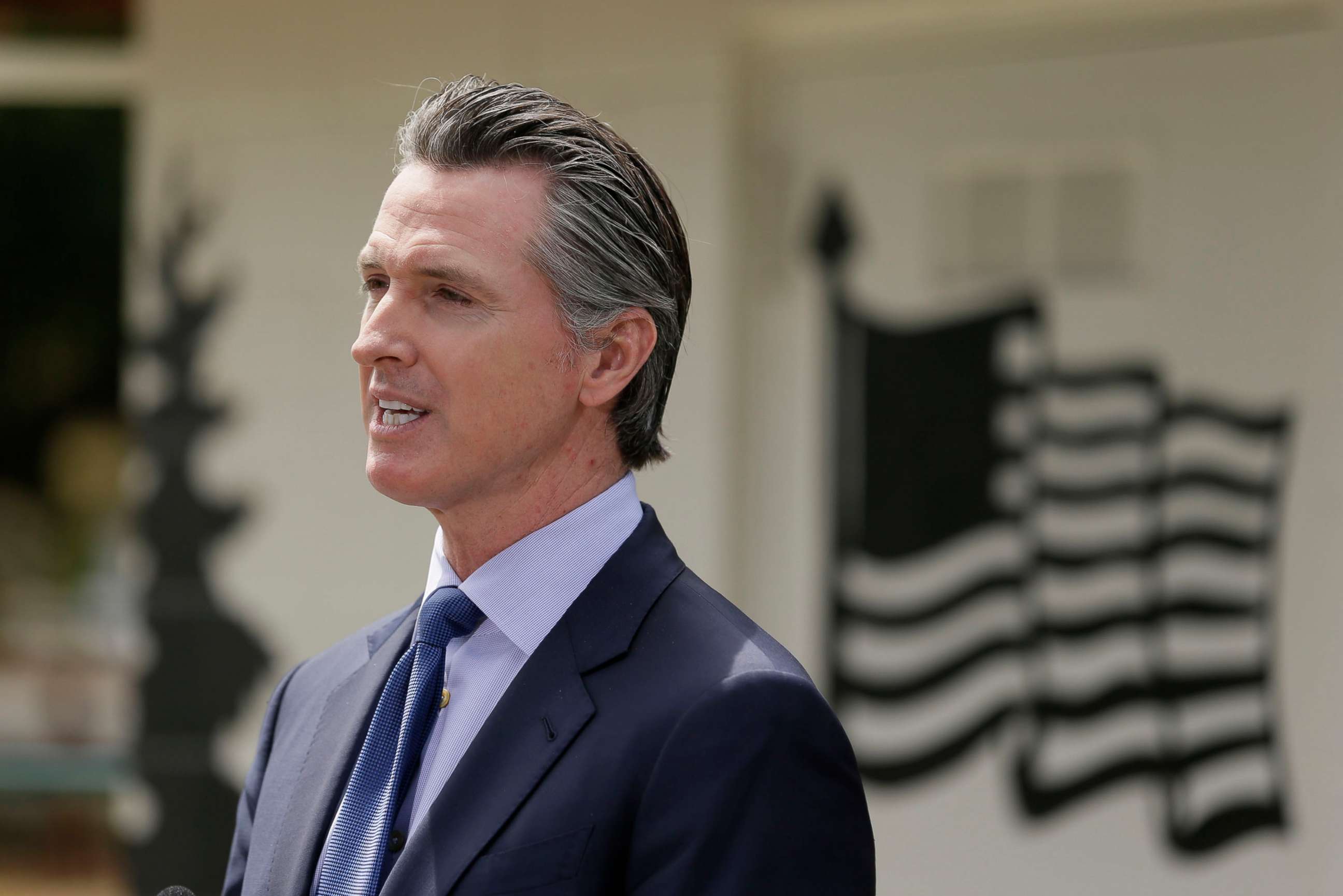 PHOTO: California Gov. Gavin Newsom speaks during a news conference at the Veterans Home of California, May 22, 2020, in Yountville, Calif.