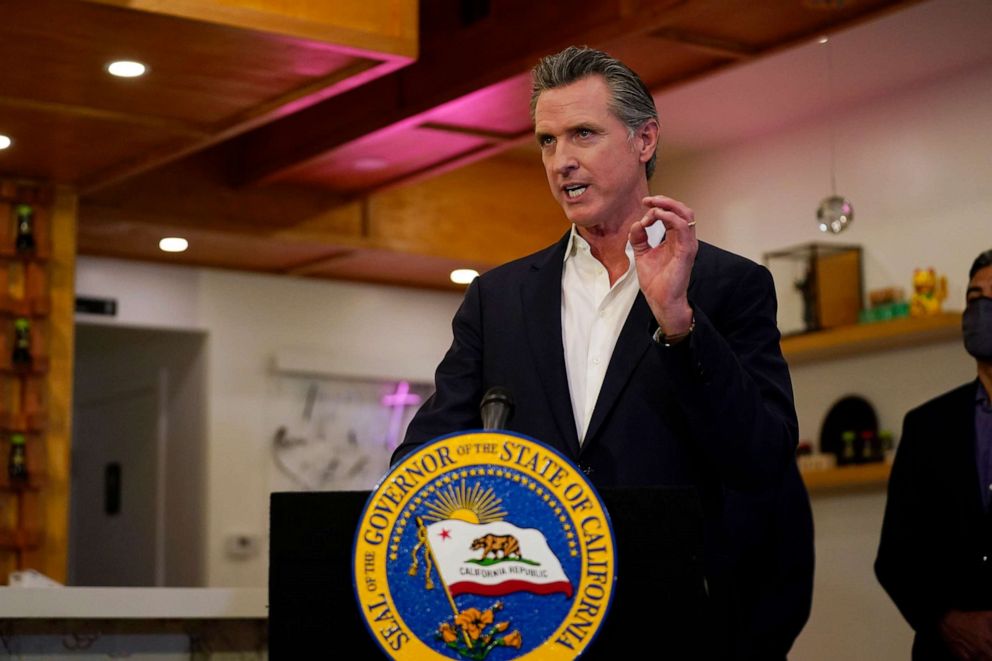 PHOTO: California Gov. Gavin Newsom speaks at Hanzo Sushi, April 29, 2021, in San Fernando, Calif.