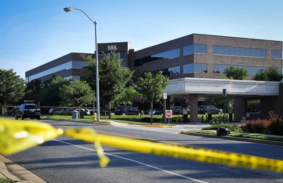 PHOTO: Police tape blocks access from a street leading to the building complex where The Capital Gazette is located in Annapolis, Md., June 29, 2018.