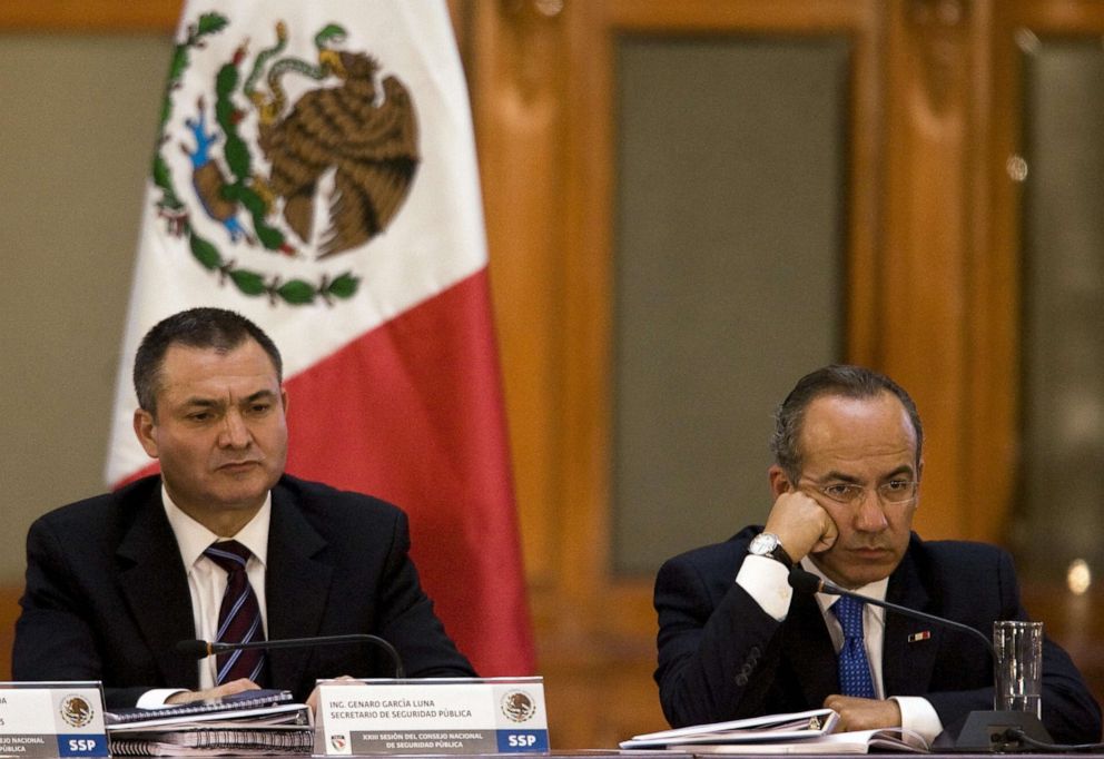 PHOTO: Mexican President Felipe Calderon (R) and Mexico's Secretary of Public Security Genaro Garcia Luna (L) take part in the XXIII Session of National Public Security at the Palacio Nacional in Mexico City, on August 21, 2008.