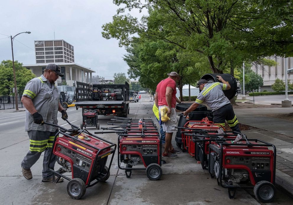 PHOTO: Workers place generators for use during the rally by President Donald Trump, the first campaign rally since the outbreak of the coronavirus pandemic, in Tulsa, on  June 19, 2020.