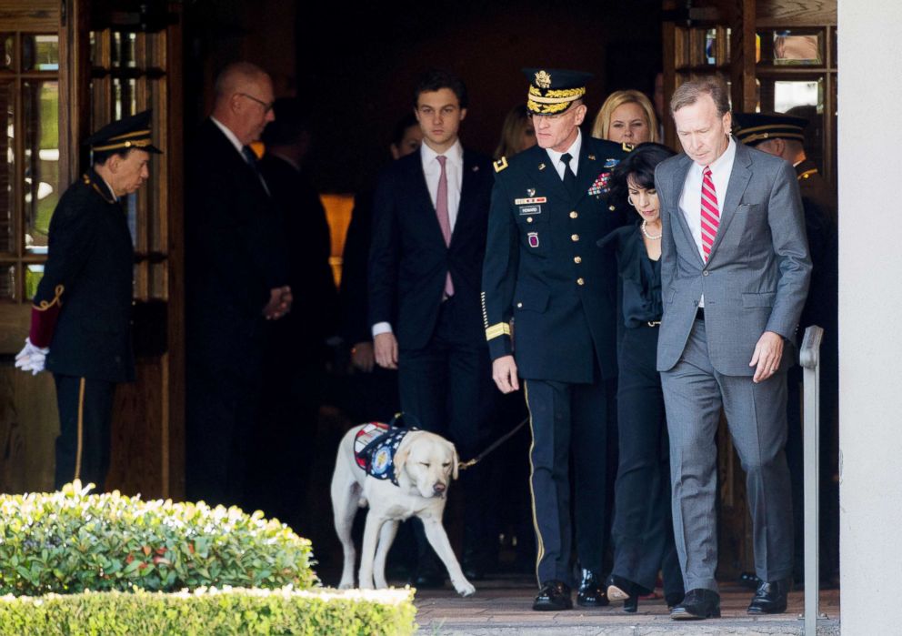 PHOTO: Neil Bush, right, and his wife Maria exit the George H. Lewis and Sons Funeral Home during the first departure ceremony for the State Funeral of president George H.W. Bush to Ellington Field in Houston, Dec. 3, 2018.