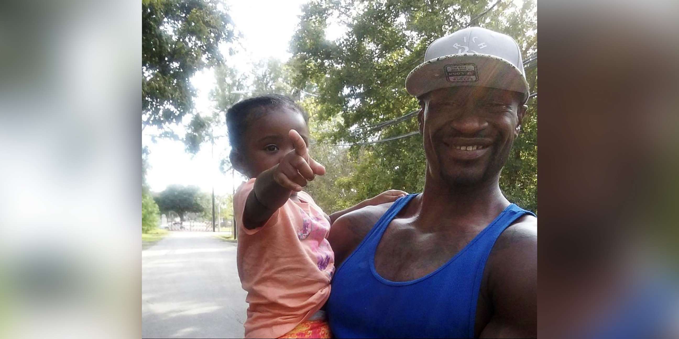 PHOTO: George Floyd, who died in Minneapolis police custody, is seen with his daughter Gianna in an undated family photo in Minneapolis.