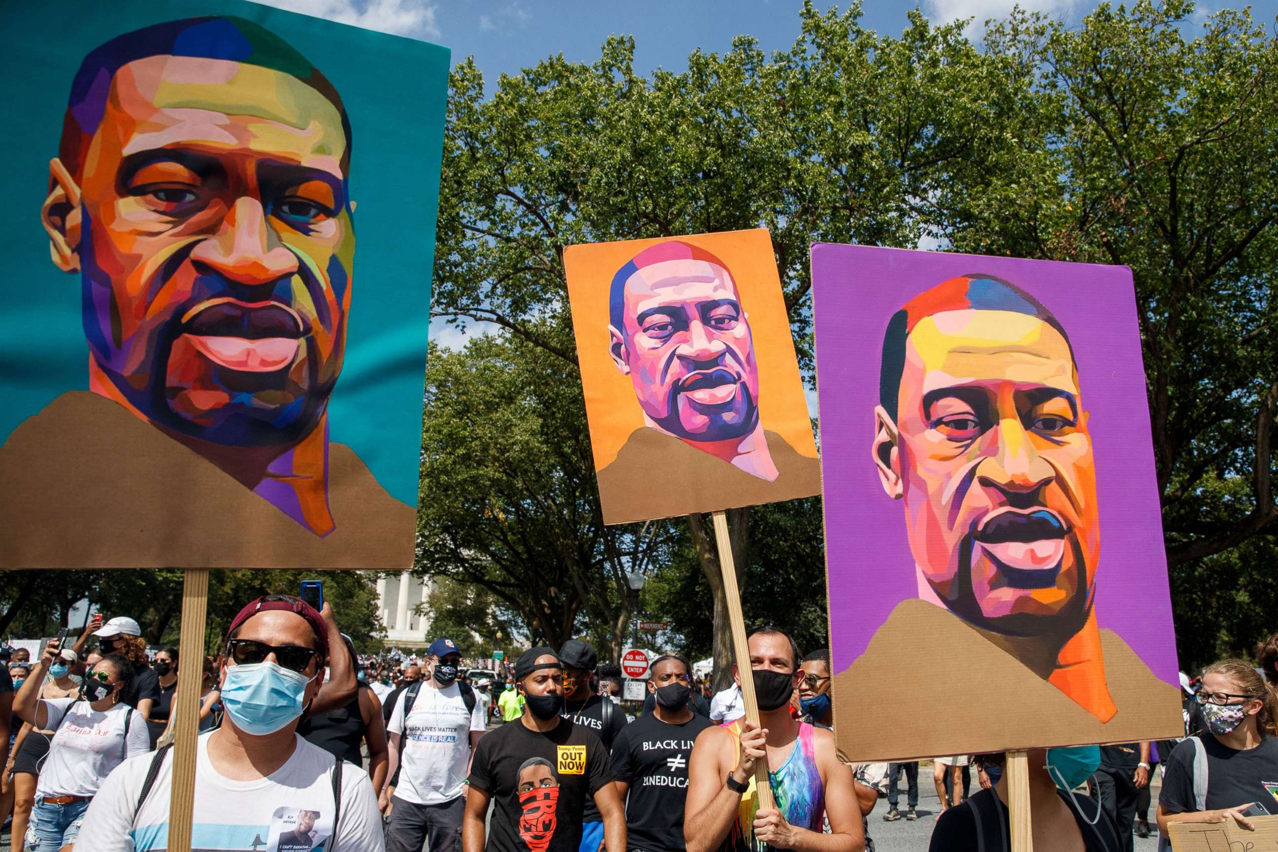 PHOTO: In this Aug. 28, 2020, file photo, protesters and activists carrying portraits of George Floyd attend the 'Commitment March: Get Your Knee Off Our Necks' march at the Lincoln Memorial in Washington, DC.
